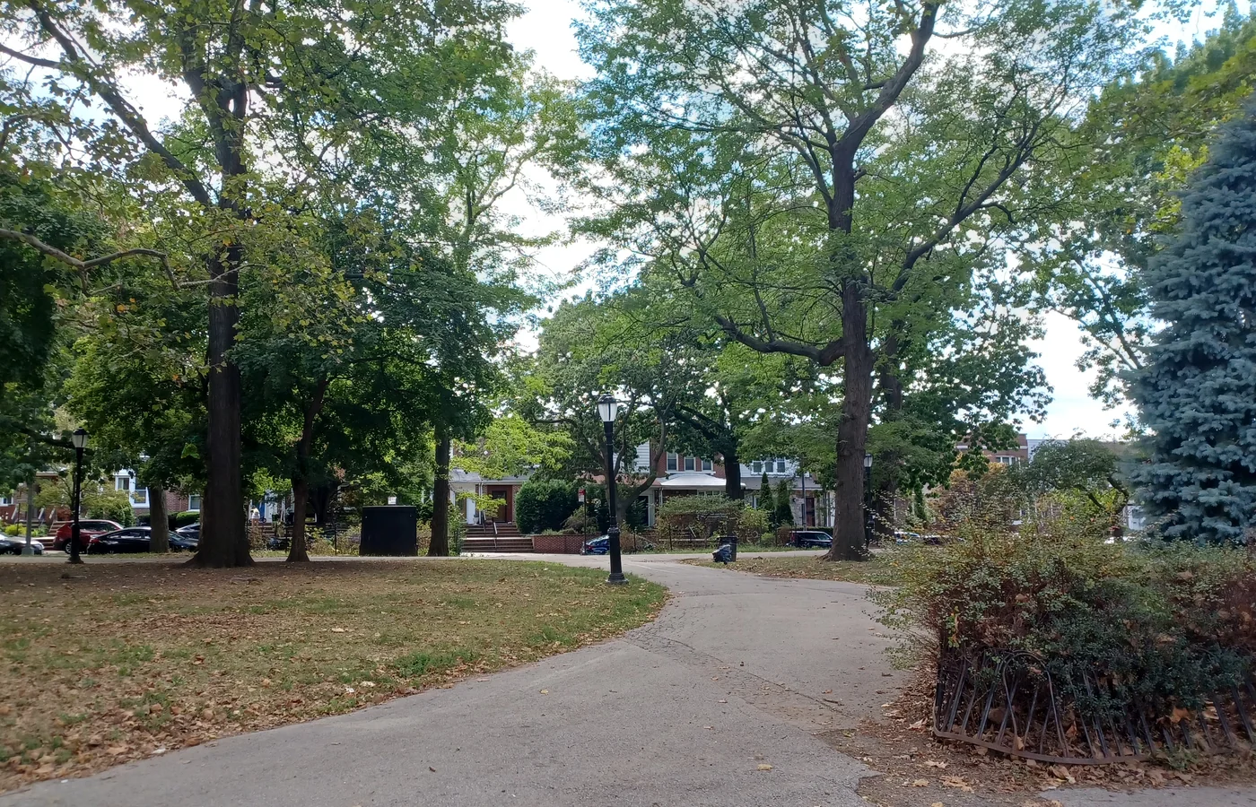 Tree-lined path through Owl's Head Park in Bay Ridge